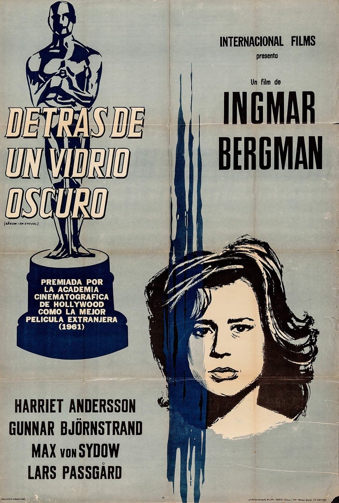 Detrás de un vidrio oscuro